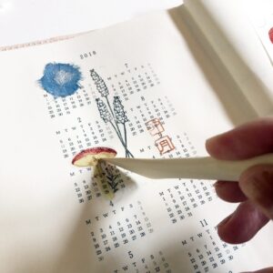 mu-print-on-sticker-wooden-stick